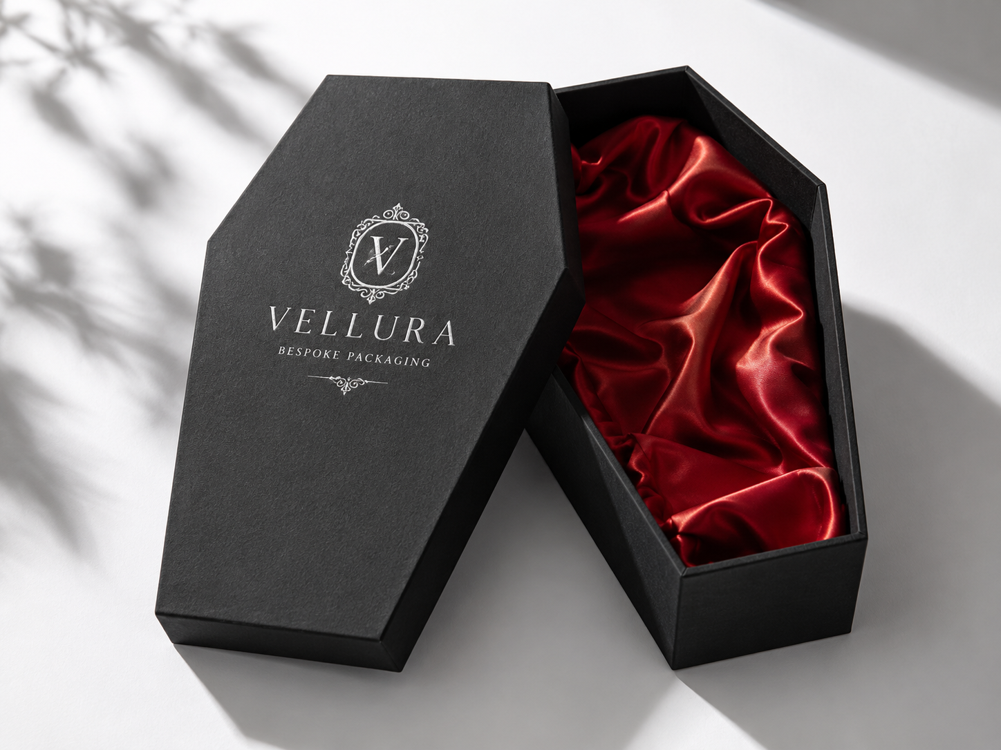 Custom branded coffin gift boxes with foil stamping and matte lamination finishes