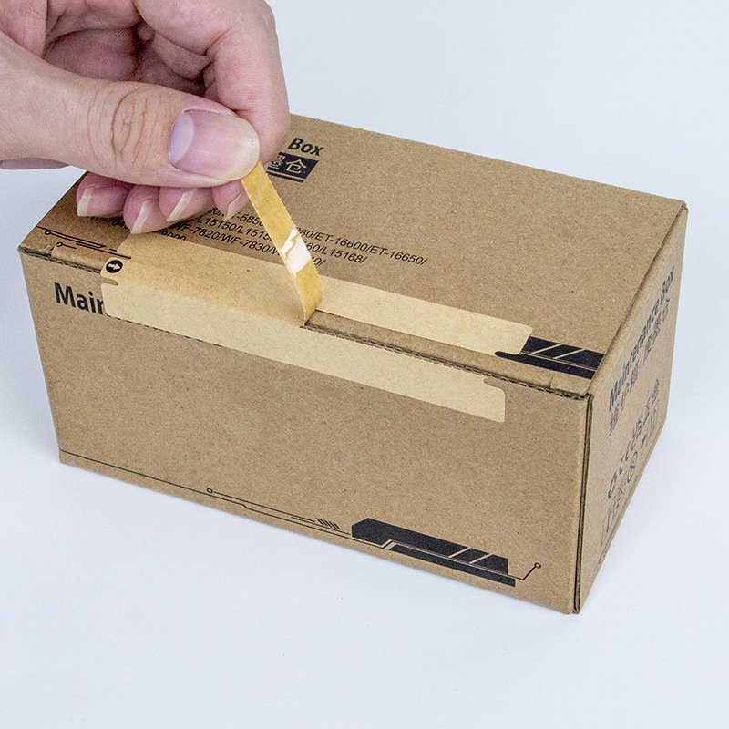 Custom kraft paper tear-off sealing sticker on shipping box