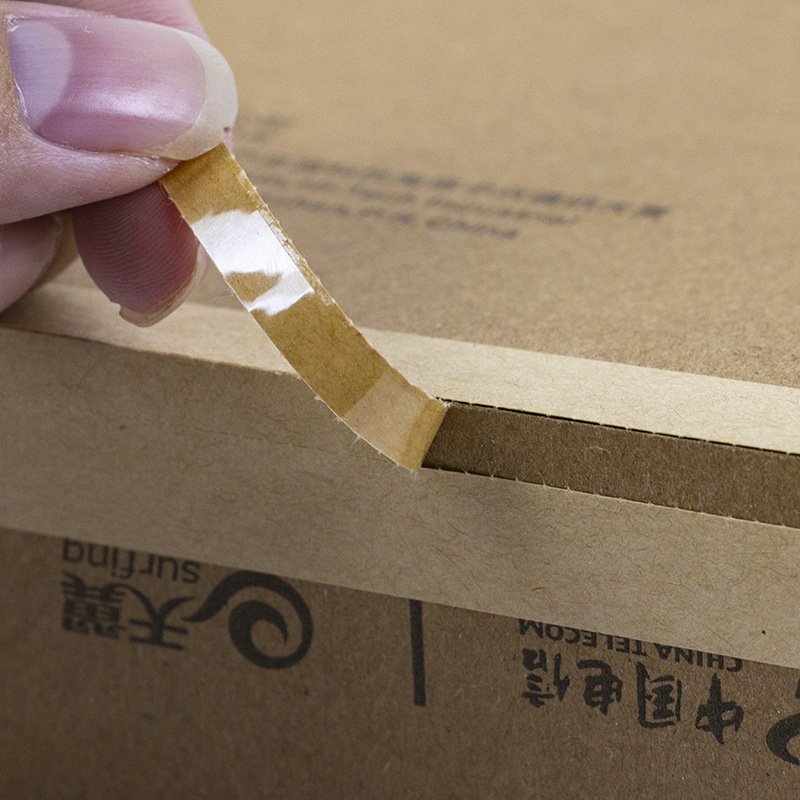 Roll of custom long kraft paper tear-strip sealing stickers