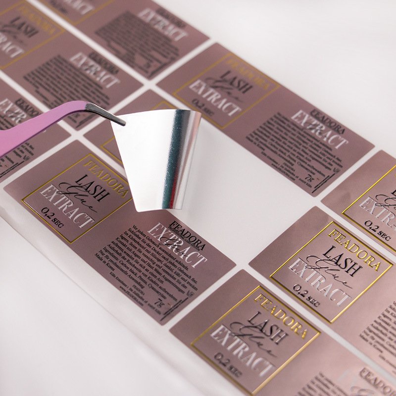 Waterproof silver self-adhesive label applied to bottle