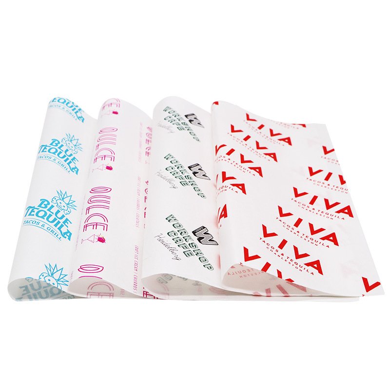 Food-grade greaseproof wrap paper holding a burger