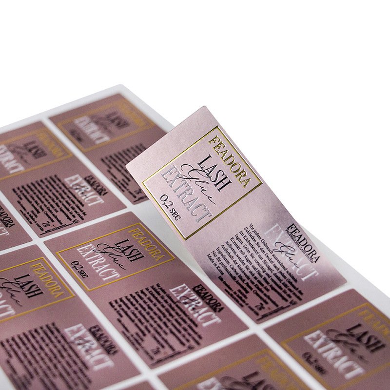 Roll of custom glossy silver self-adhesive bottle labels