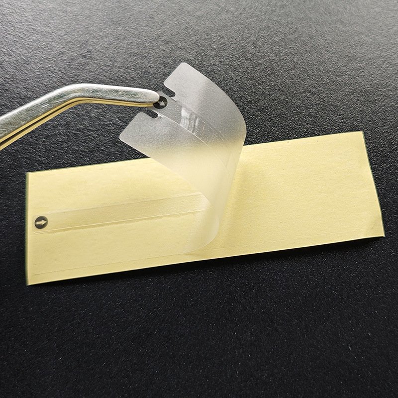 Roll of clear tamper-evident box seal stickers